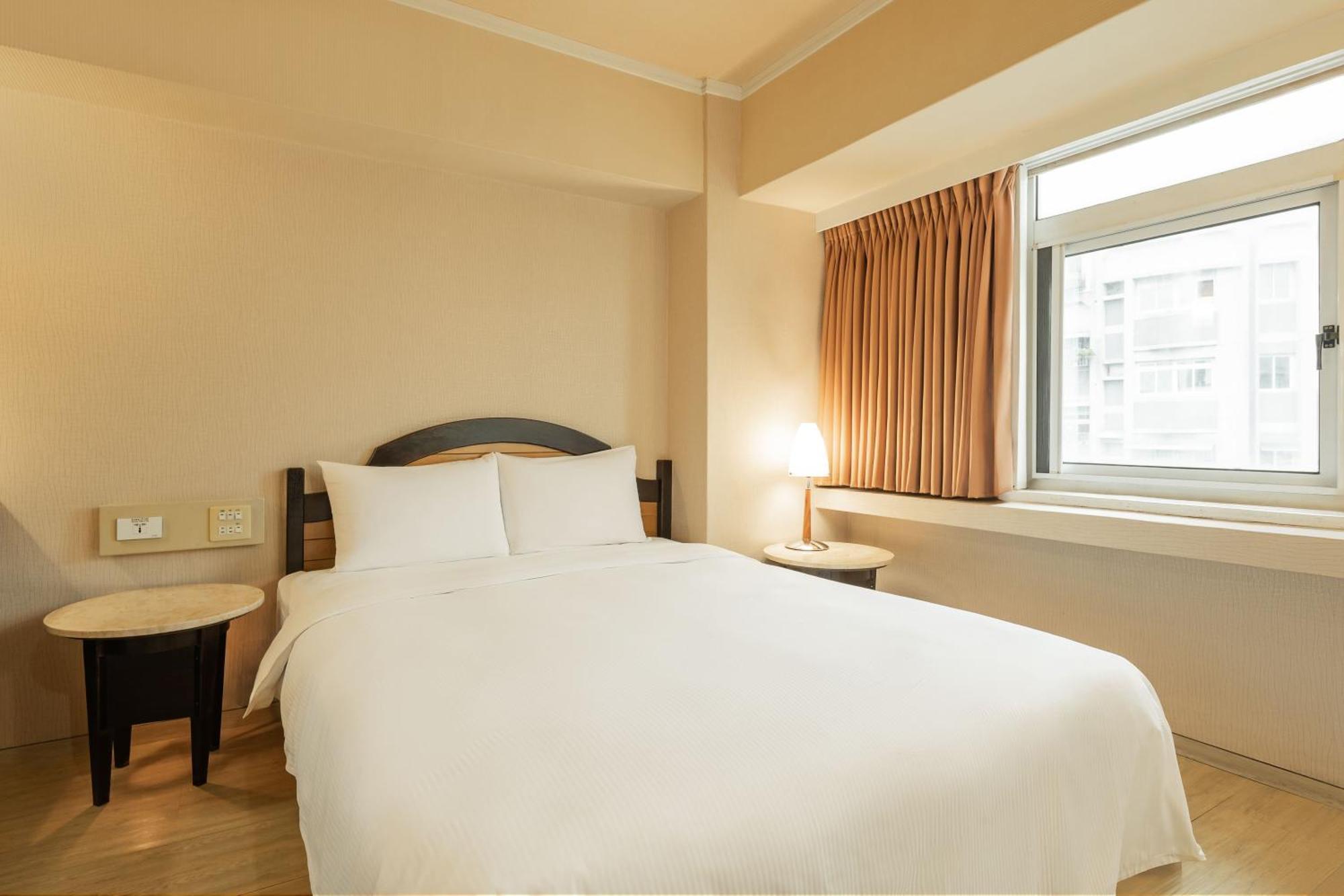 Kindness Hotel Weiwuying Kaohsiung Rom bilde