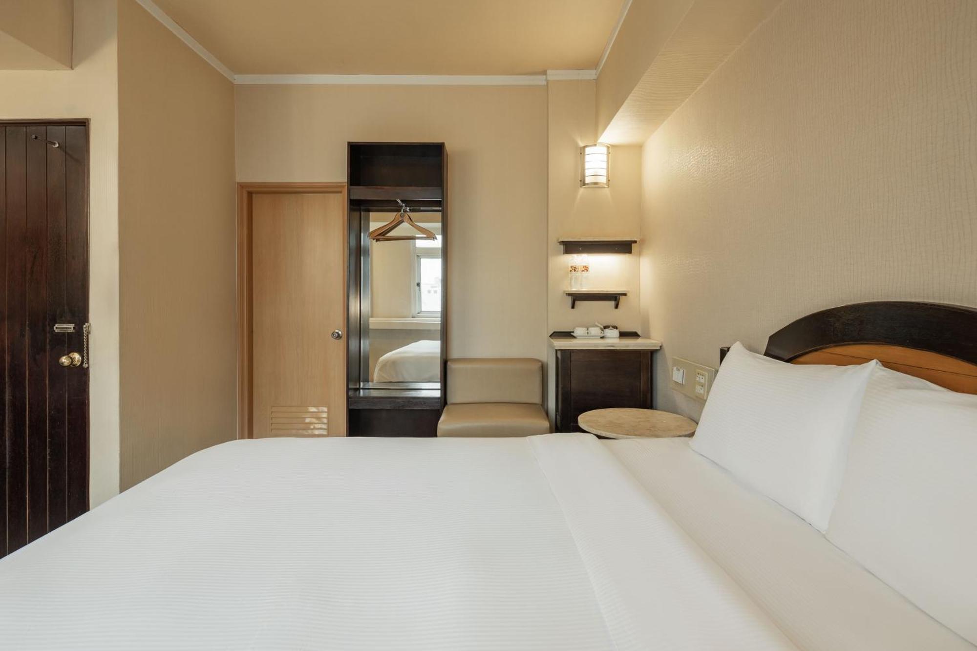 Kindness Hotel Weiwuying Kaohsiung Rom bilde