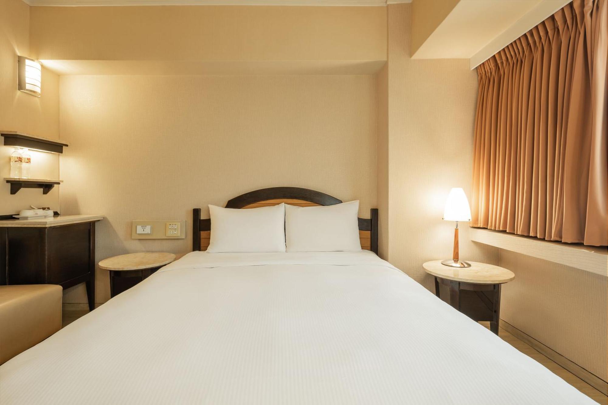 Kindness Hotel Weiwuying Kaohsiung Rom bilde
