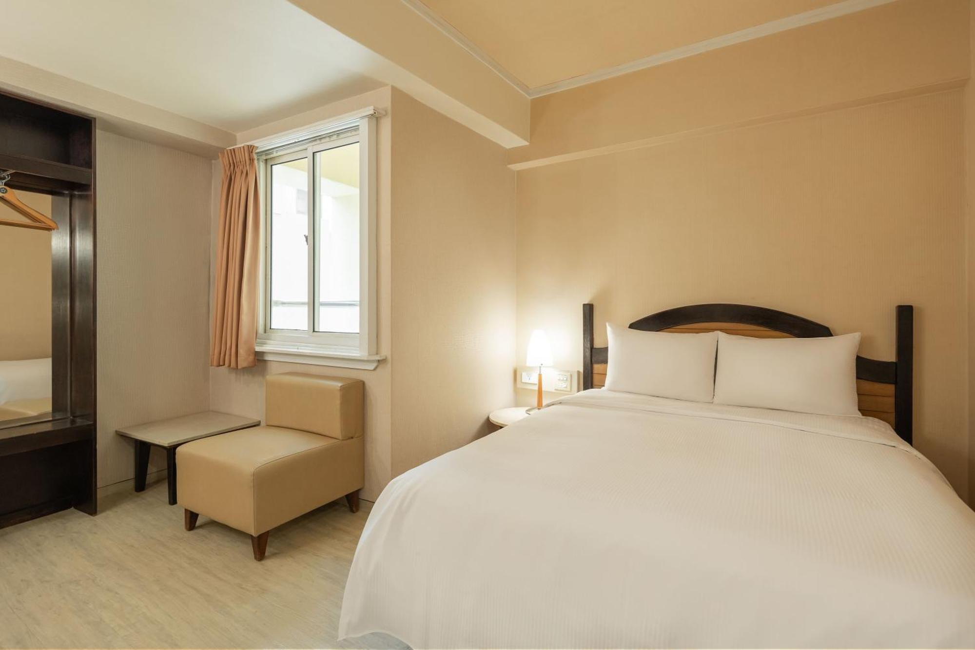 Kindness Hotel Weiwuying Kaohsiung Rom bilde