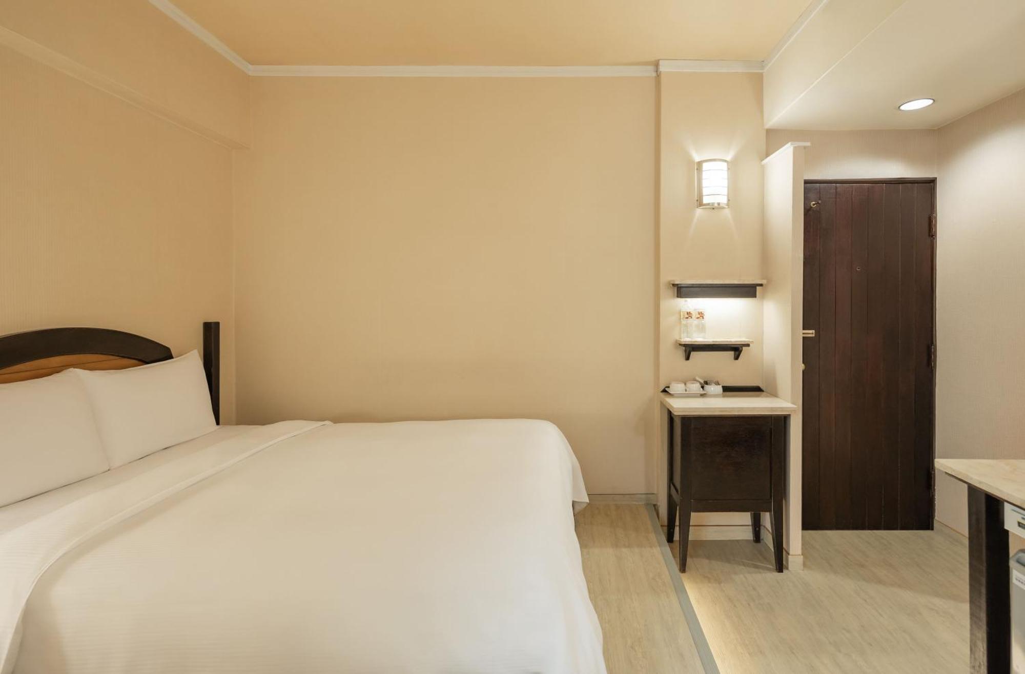 Kindness Hotel Weiwuying Kaohsiung Rom bilde