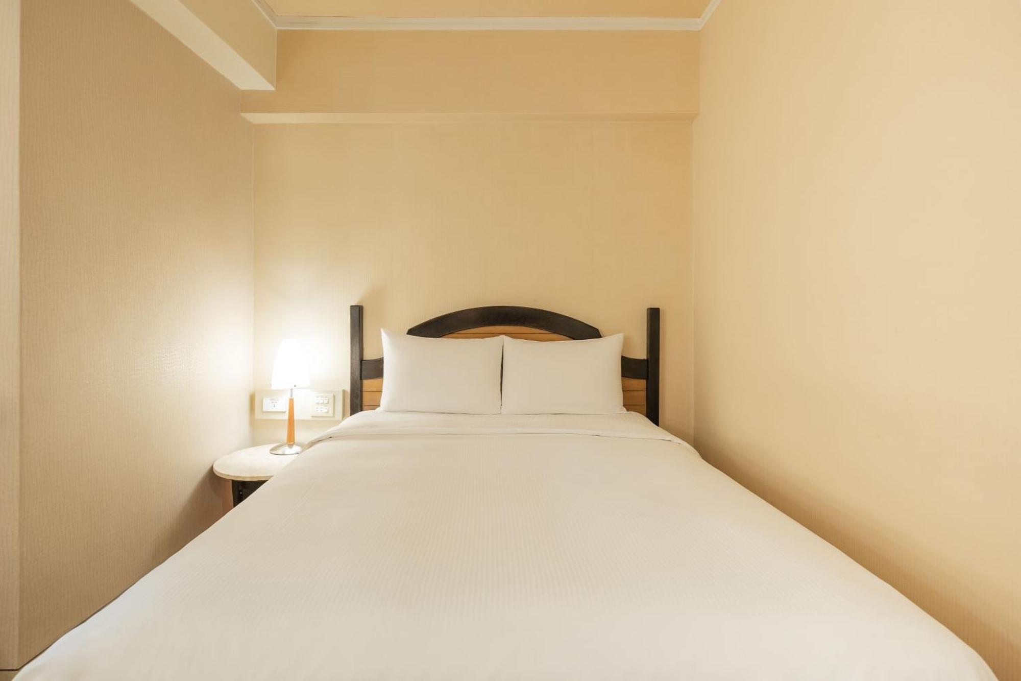 Kindness Hotel Weiwuying Kaohsiung Rom bilde