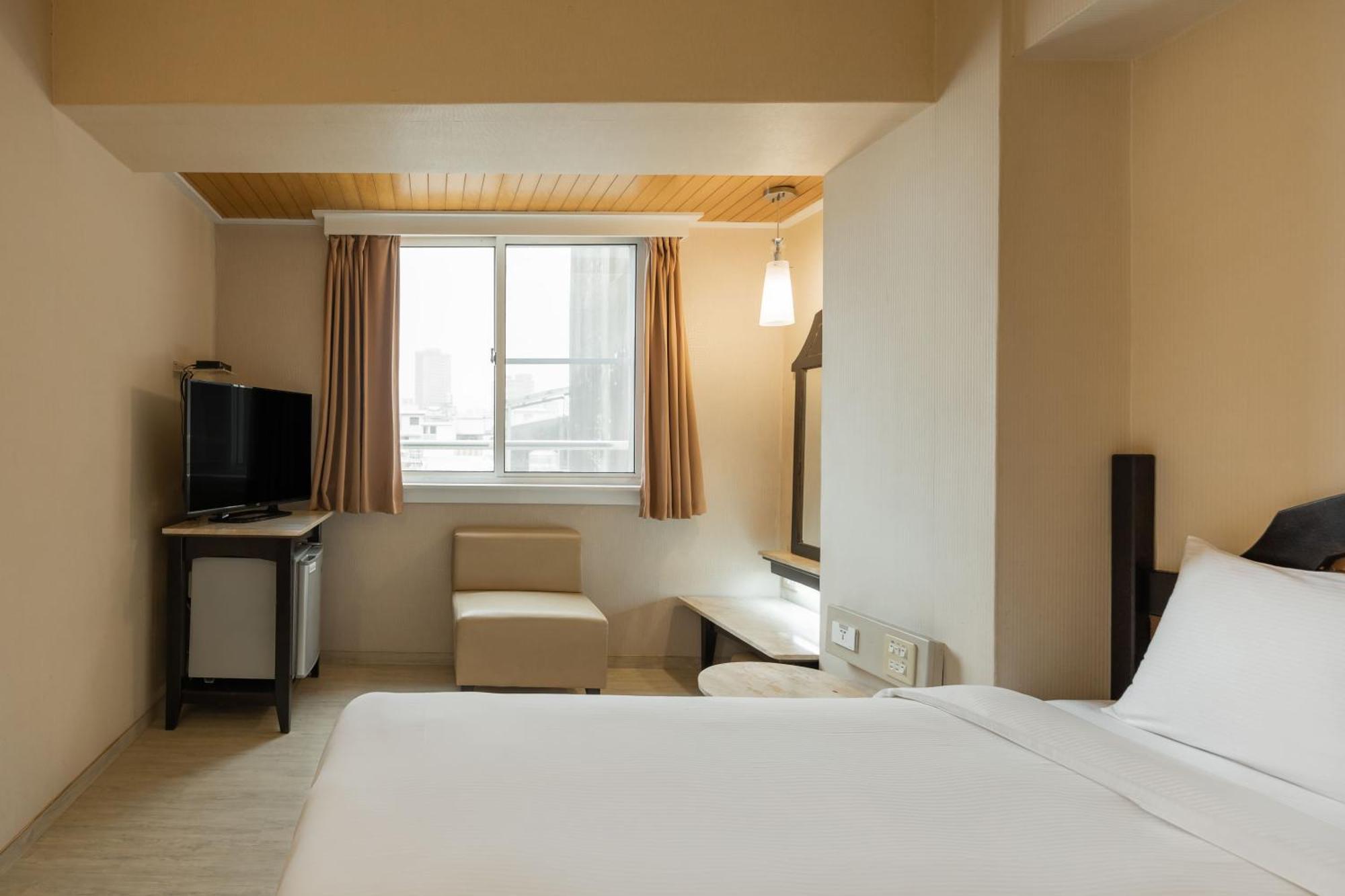 Kindness Hotel Weiwuying Kaohsiung Rom bilde