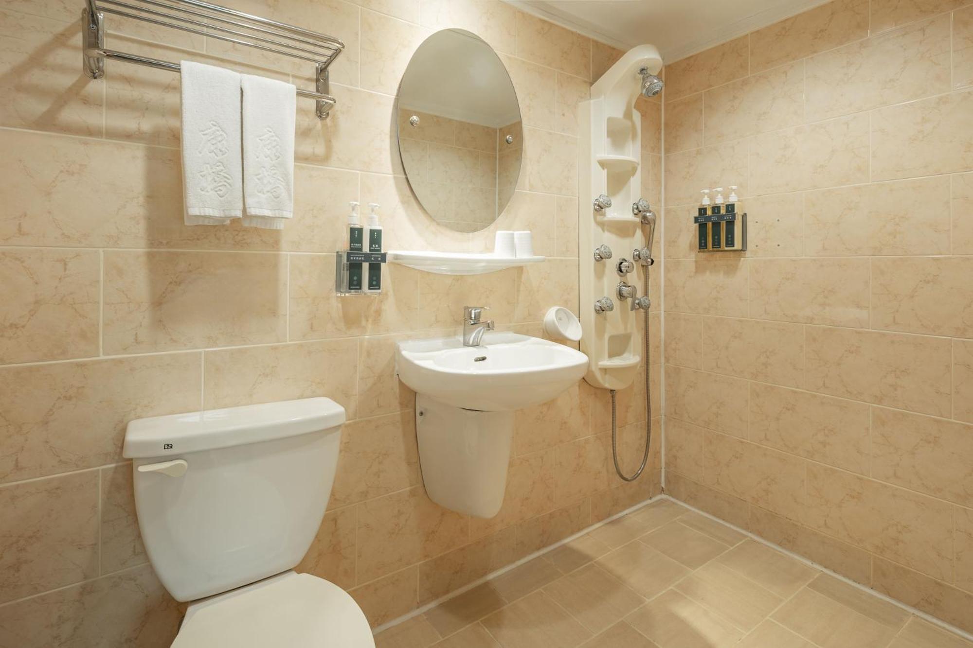 Kindness Hotel Weiwuying Kaohsiung Rom bilde
